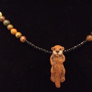 Handmade Beaver necklace.
